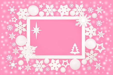 Christmas white tree star snowflake fantasy background frame on pink. Border design with abstract snow for festive holiday season Noel, Yule, Xmas. Gift tag, greeting card, label.の写真素材