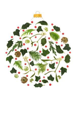 Winter Christmas nature flora round shape bauble decoration with holly berries. Natural design concept for pagan druid solstice and festive Xmas holiday season.の写真素材