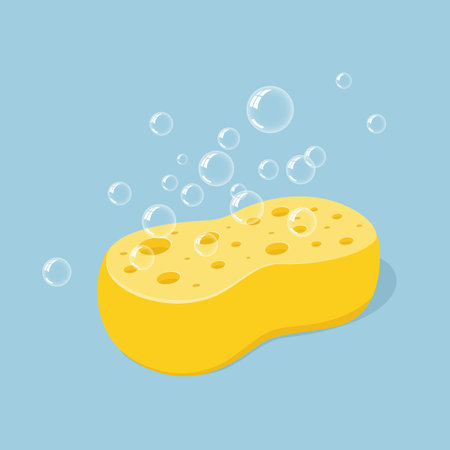 Yellow sponge for washing or cleaning with foam bubbles. Vector illustration in cartoon style, icon isolatedのイラスト素材