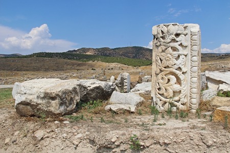 The ruins of the ancient Hierapolis city next to the travertine pools of Pamukkale, Turkey.の写真素材