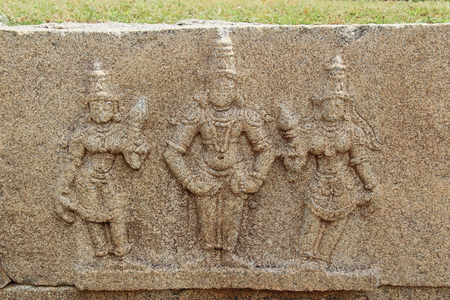 Stone bas-reliefs on the ruins of a hindu temple near the Vittala Temple in Hampi, Karnataka, India. Unesco World Heritage Site. The famous tourist destination from GOA.の写真素材
