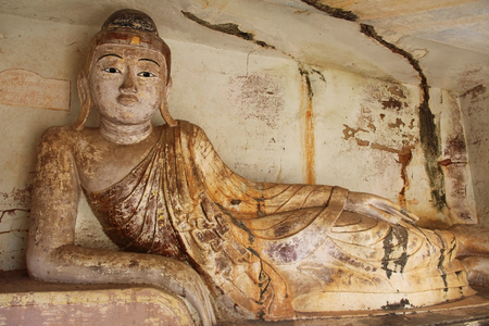 Old Buddha statue at Pho Win Taung Caves, Monywa city, Sagaing State, Myanmar, Asia. New interesting tourist destination.のeditorial素材