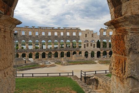 Ancient roman amphitheater in sunny day in Pula, Istria, Croatia, Europe. Roman Colosseum in Pula. An arena similar to Colosseum of Rome. Famous travel destination.のeditorial素材