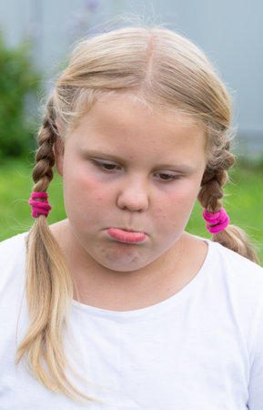 Emotions. The girl expresses various emotions on her face.
