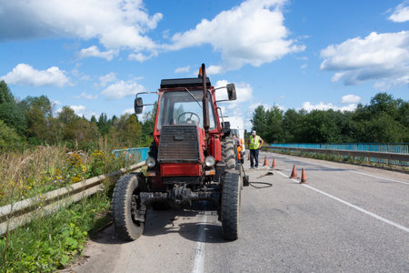 Special vehicles of the road service are parked on the side of the road. Road works. Kuvshinovo, Tver oblast.のeditorial素材