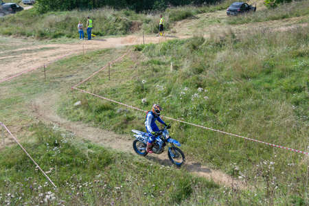 On the motocross 2020. A motorcyclist rides a motorcycle, overcoming obstacles. Torzhok, Tver region, Russia.のeditorial素材
