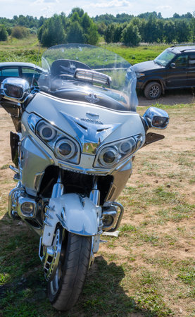 At Motocross 2020, a motorcycle stands in an open-air clearing. Torzhok, Tver region, Russia.のeditorial素材