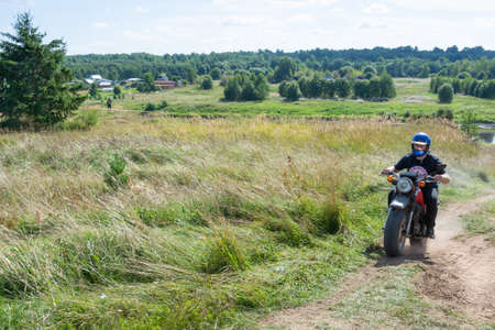 On the motocross 2020. A motorcyclist rides a motorcycle, overcoming obstacles. Torzhok, Tver region, Russia.のeditorial素材
