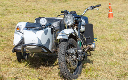 At Motocross 2020, a motorcycle stands in an open-air clearing. Torzhok, Tver region, Russia.
