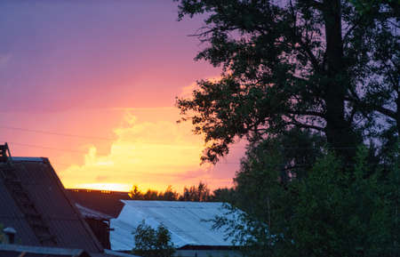 Incredibly beautiful, colorful sunset in the evening skyの写真素材