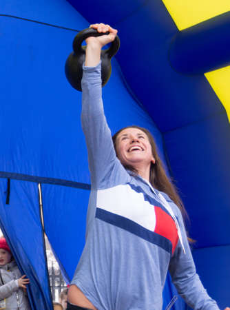 Maslenitsa 2021. A festive concert. The creative team performs on stage. Moscow region, Russia.のeditorial素材