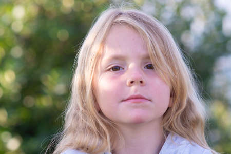 Emotions. A little girl expresses different emotions on her face.