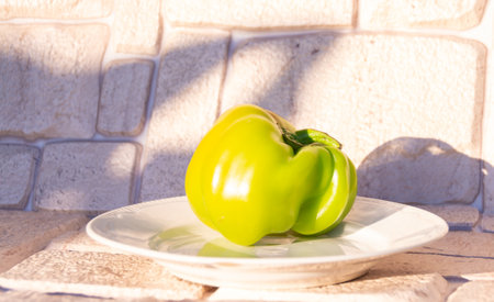 Green large sweet pepper ripened in the country.の写真素材