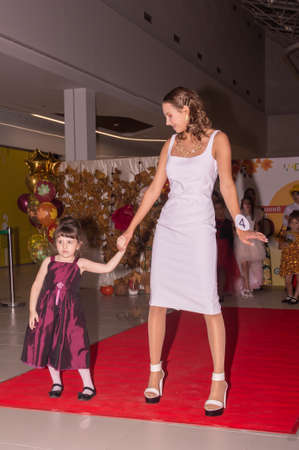 Beautiful dressed-up children perform at a children's beauty contest.のeditorial素材