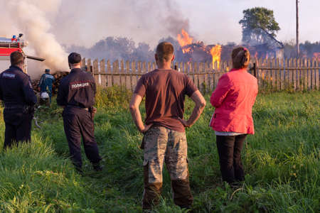 A fire in the village. Burning wooden houses in the village of Rantsevo, Tver region.のeditorial素材
