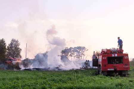 A fire in the village. Burning wooden houses in the village of Rantsevo, Tver region.のeditorial素材