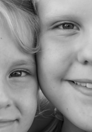 Sisters. Friends. Portrait. Beautiful elegant girls. Children are models.の写真素材