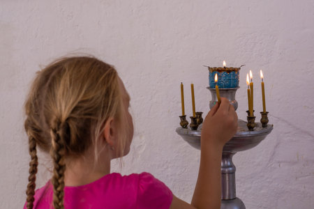 Chapel of Xenia of St. Petersburg, Ostashkov, Evstafievskaya Street. An Orthodox church. A girl in...