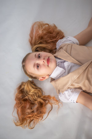 Portrait. Emotions. The girl is a model in fashionable clothing.の写真素材