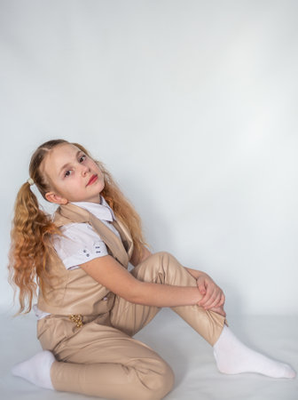 Portrait. Emotions. The girl is a model in a fashionable suit.の写真素材