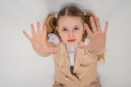 Portrait. Emotions. The girl is a model in fashionable clothing.の写真素材