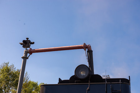 Ostashkov Tver region, Russia-08/25/2024. RETROPOEZD "SELIGER" on steam traction. The locomotive's tender is filled with water from a hydraulic columnの写真素材