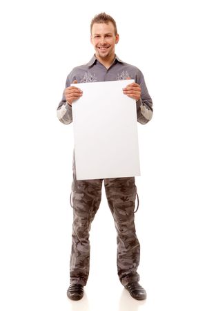 smiling young handsome man with white clear board on white backgroundの写真素材
