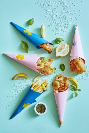 Fast food in a party mood on a blue background