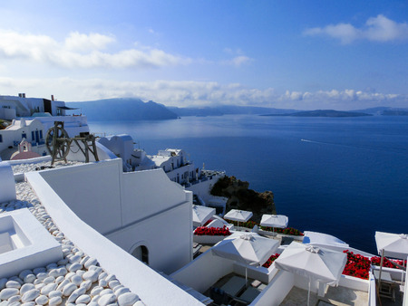 View to the sea from Oia the most beautiful village of Santorini island in Greeceの写真素材