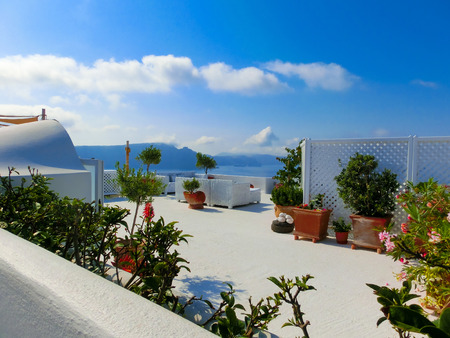 View to the sea from stairs in Oia the most beautiful village of Santorini island in Greece