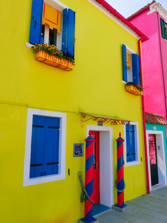 Burano, Venice, Italy - May 10, 2014: Colorful old houses on the Island of Burano near Venice, Italyのeditorial素材