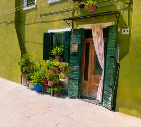 Burano, Venice, Italy - May 10, 2014: Colorful old houses on the Island of Burano near Venice, Italyのeditorial素材