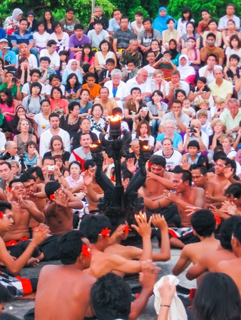 Uluwatu, Bali, Indonesia - December 27, 2008: The spectators and performers of traditional religious dance Kecak at Uluwatu, Bali, Indonesiaのeditorial素材