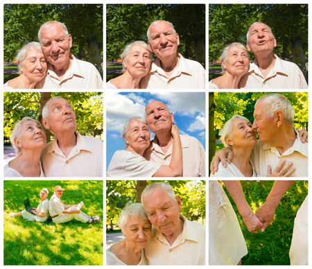 The happy old couple in the summer on a walkの写真素材