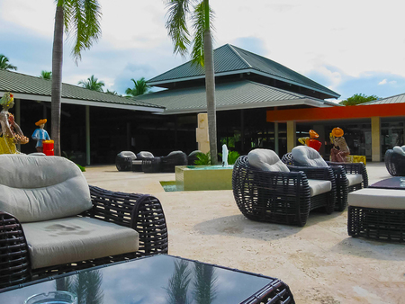 Punta Cana, Dominican republic - February 03, 2013: The Barcelo Bavaro Beach hotel under palmsのeditorial素材