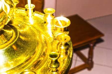 The candles and lamp close-up. Interior of Church