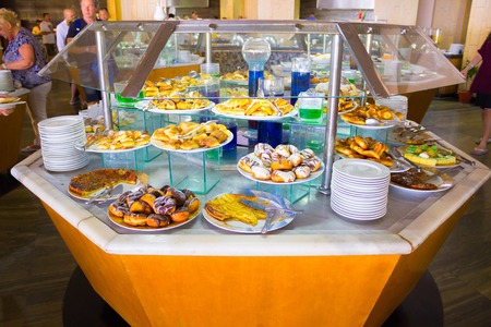 Sharm El Sheikh, Egypt - April 8, 2017: The people choose food in the buffet restaurantのeditorial素材