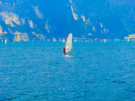 Torbole -A windsurfing on Lake Garda in Torboleの写真素材