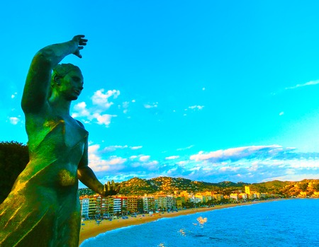 The sculpture of woman and beach in costa Brava of Catalonia Spain at sunsetのeditorial素材