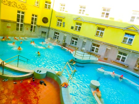 Budapest, Hungary - January 07, 2016: Tourists enjoy at the Lukacs Bathのeditorial素材