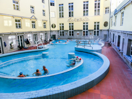 Budapest, Hungary - January 07, 2016: Tourists enjoy at the Lukacs Bathのeditorial素材