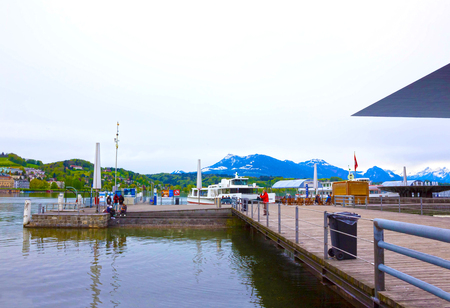 Lucerne, Switzerland - May 02, 2017: The pier at coast line at Lucerne lake, Switzerland - May 02,...