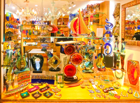 Venice, Italy - May 04, 2017: The shop with traditional souvenirs and gifts like Murano glass to tourists visiting Venice.のeditorial素材