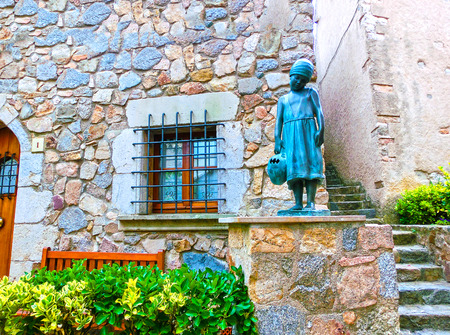 Tossa de Mar, Spain - September 14, 2015: Bronze statue of little girl in the Spanish town of Tossa de Marのeditorial素材