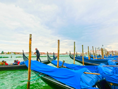 Venice, Italy - May 04, 2017: gondola sails down the channel in Venice, Italy. Gondola is a traditional transport in Venice, Italyのeditorial素材