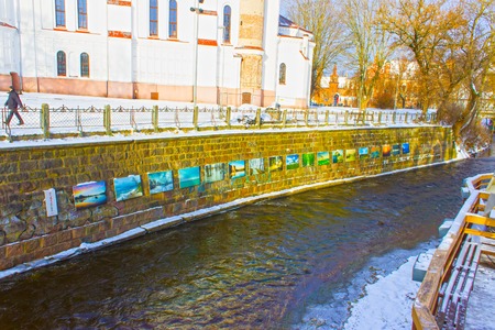 VIlnius, Lithuania - January 05, 2017: Vilnele river flowing past Uzupis district, a neighborhood in Vilnius, Lithuania, located in Vilnius old townのeditorial素材