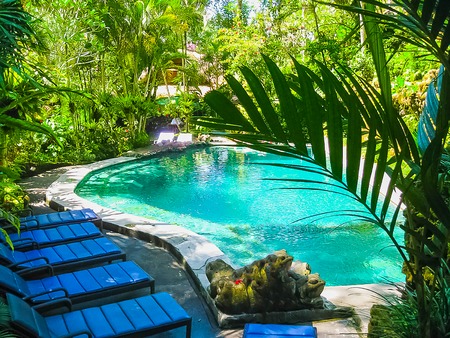 Bali, Indonesia - April 13, 2012: View of swimming pool at Hotel Tjampuhan and Spa at Ubudのeditorial素材