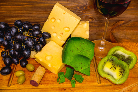 Wine and grape on wooden backgroundの写真素材