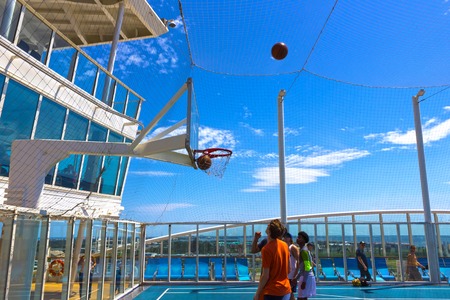 Cape Canaveral, USA - April 29, 2018: The upper deck with mini basketball court at cruise liner or ship Oasis of the Seasのeditorial素材