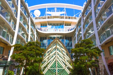 Cape Canaveral, USA - April 29, 2018: The central park at cruise liner or ship Oasis of the Seas by Royal Caribbeanのeditorial素材